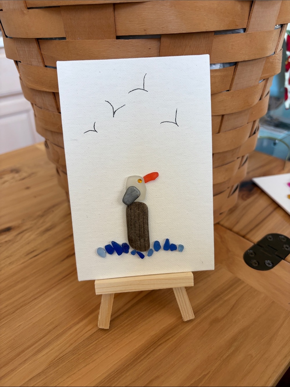 Handcrafted Seagull Pebble Art Canvas - Blue Accents